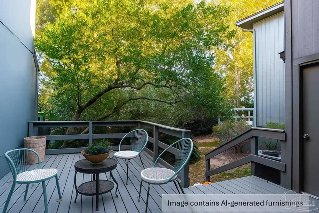 a view of balcony with furniture