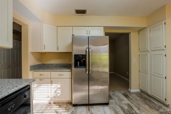 a view of a house with wooden floor