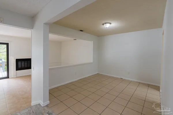 a view of a pathway of flower plants