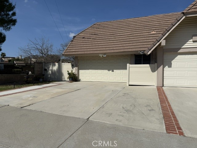 a view of a house with a parking space