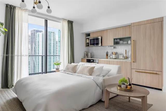 a kitchen with a stove and a microwave