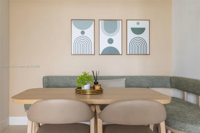 a view of a chair and table in the balcony
