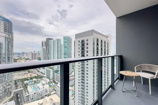 a view of a city with tall buildings