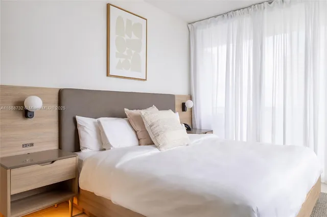 a kitchen with granite countertop a shelf