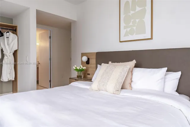 a view of a chairs and table in the balcony