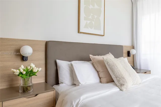 a view of a swimming pool and an outdoor seating