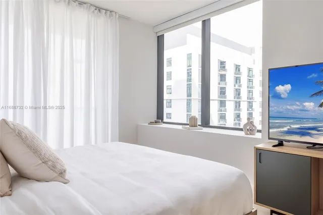 a view of a city with tall buildings