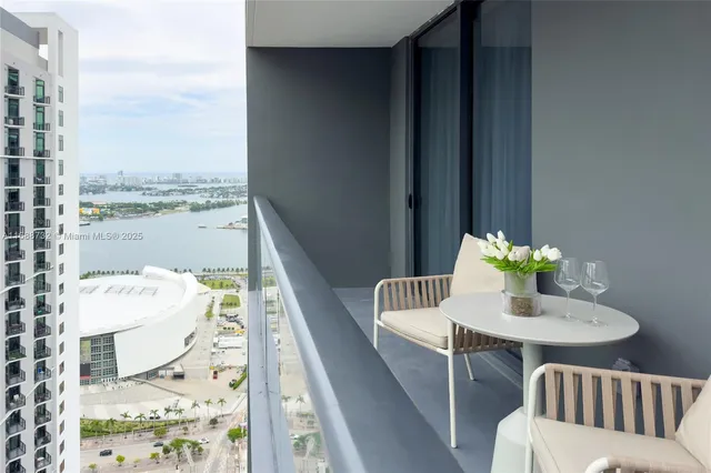 a bathroom with a sink a mirror and a window