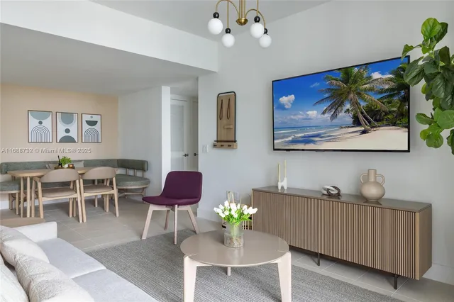 a living room with furniture and a potted plant