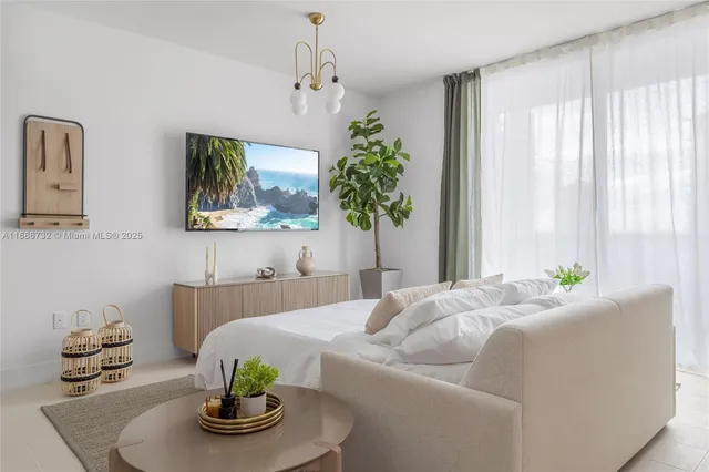 a kitchen with stainless steel appliances a microwave a sink and cabinets