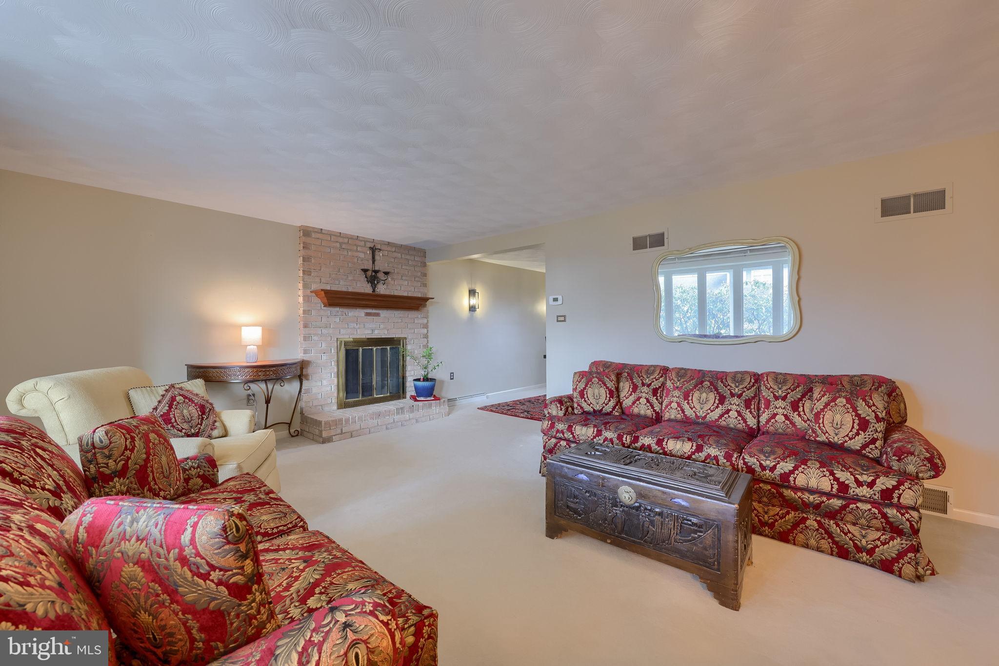 3161 Starlight Drive York, PA 17402 - Photo 14 of 51 Cozy living space with inviting fireplace.