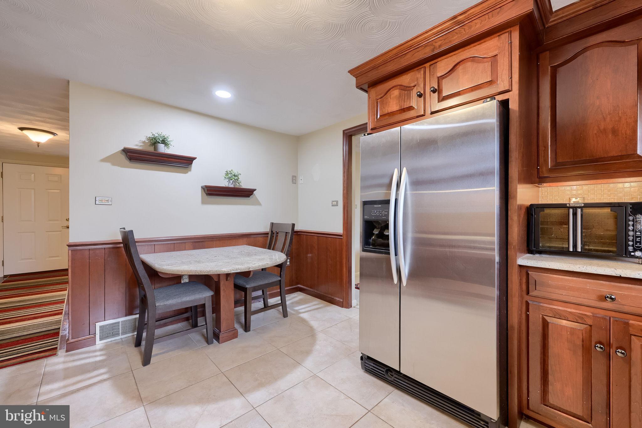 3161 Starlight Drive York, PA 17402 - Photo 23 of 51 Cozy kitchen with warm wood accents.