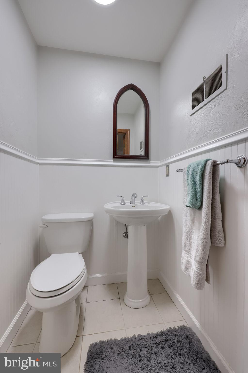 3161 Starlight Drive York, PA 17402 - Photo 39 of 51 Chic 1/2 bath off of lower level family room.