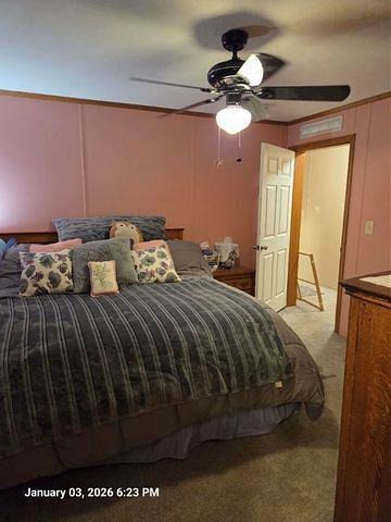 2639 Lilac Lane Sycamore, IL 60178 - Photo 10 of 16 a bedroom with a bed and a chandelier