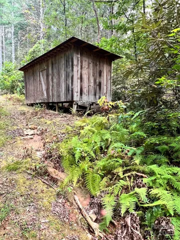 a picture of a rug with a white wall and white cabinet