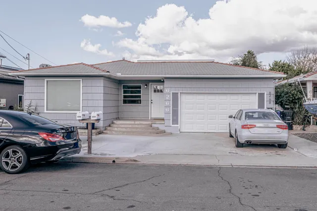 a car parked in front of a house