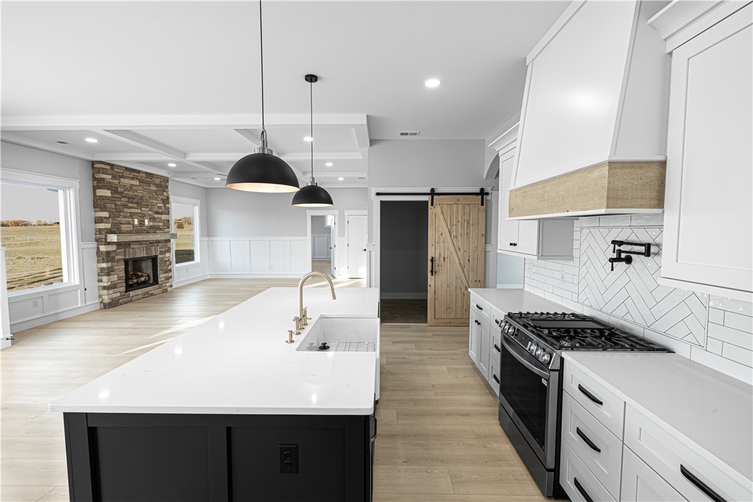 1296 Hebron Church Road Iva, SC 29655 - Photo 31 of 37 This bright and open space features a gourmet kitchen seamlessly flowing into a cozy living area.