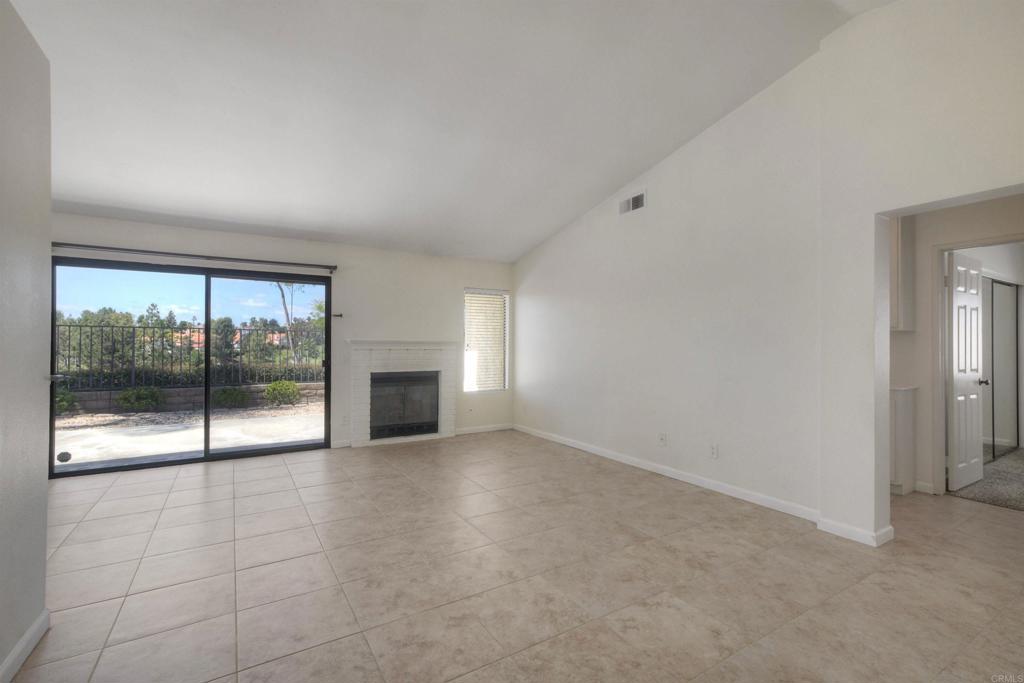 1394 Longfellow Road Vista, CA 92081 - Photo 9 of 50 a view of empty room with floor to ceiling window