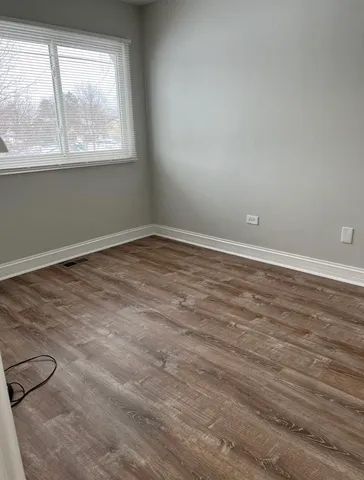 a view of a deck with furniture