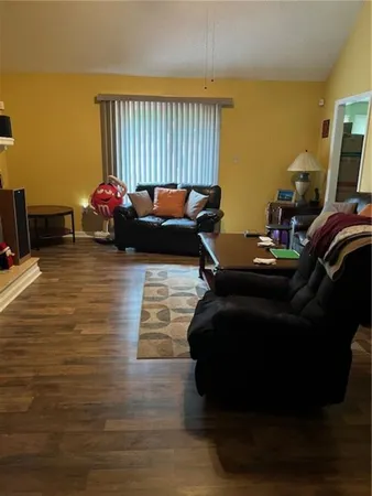 a bed room with a bed and a tv