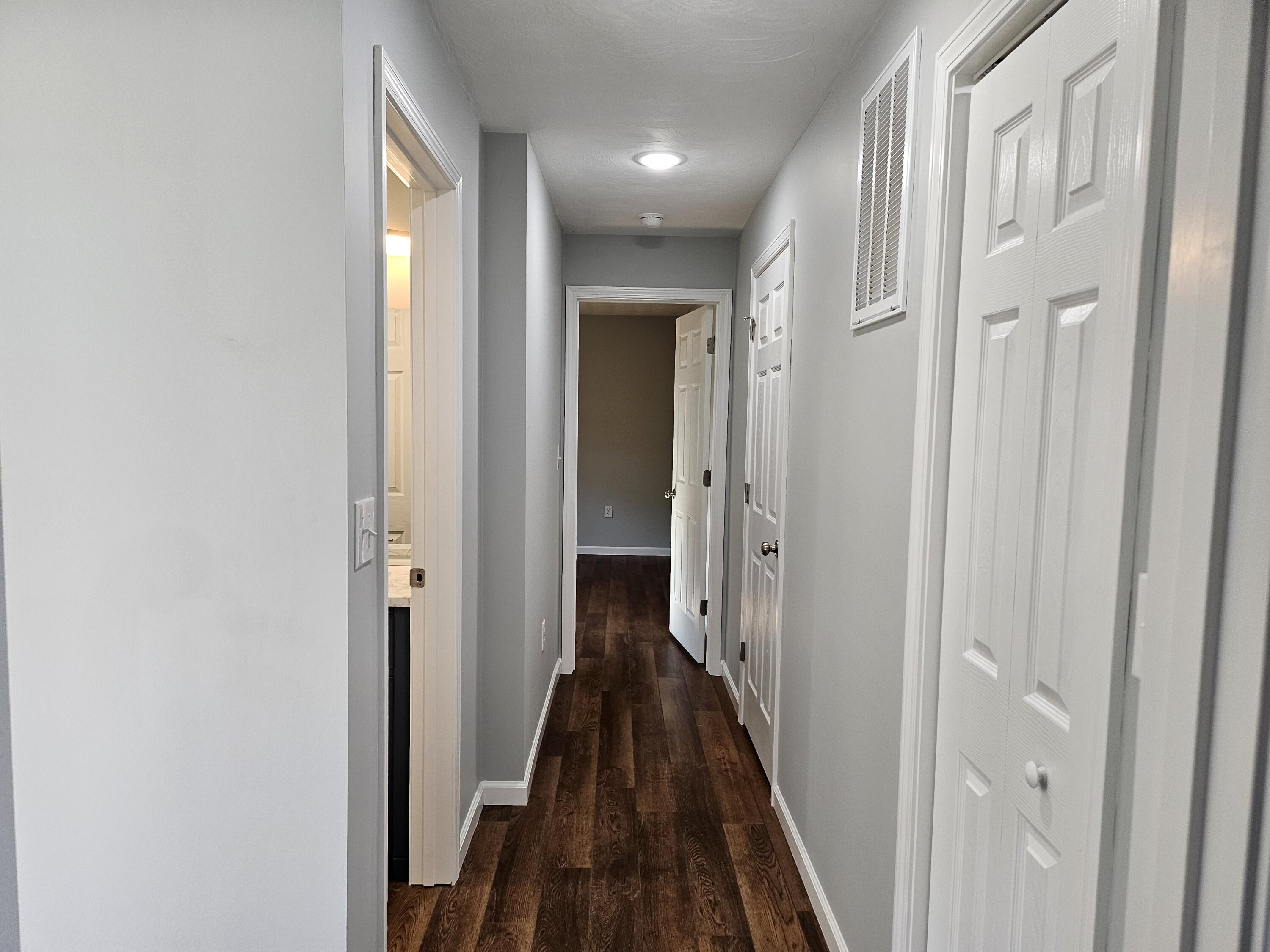 4443 Keefer Road Roanoke, VA 24018 - Photo 12 of 26 a view of a hallway with a wooden floor