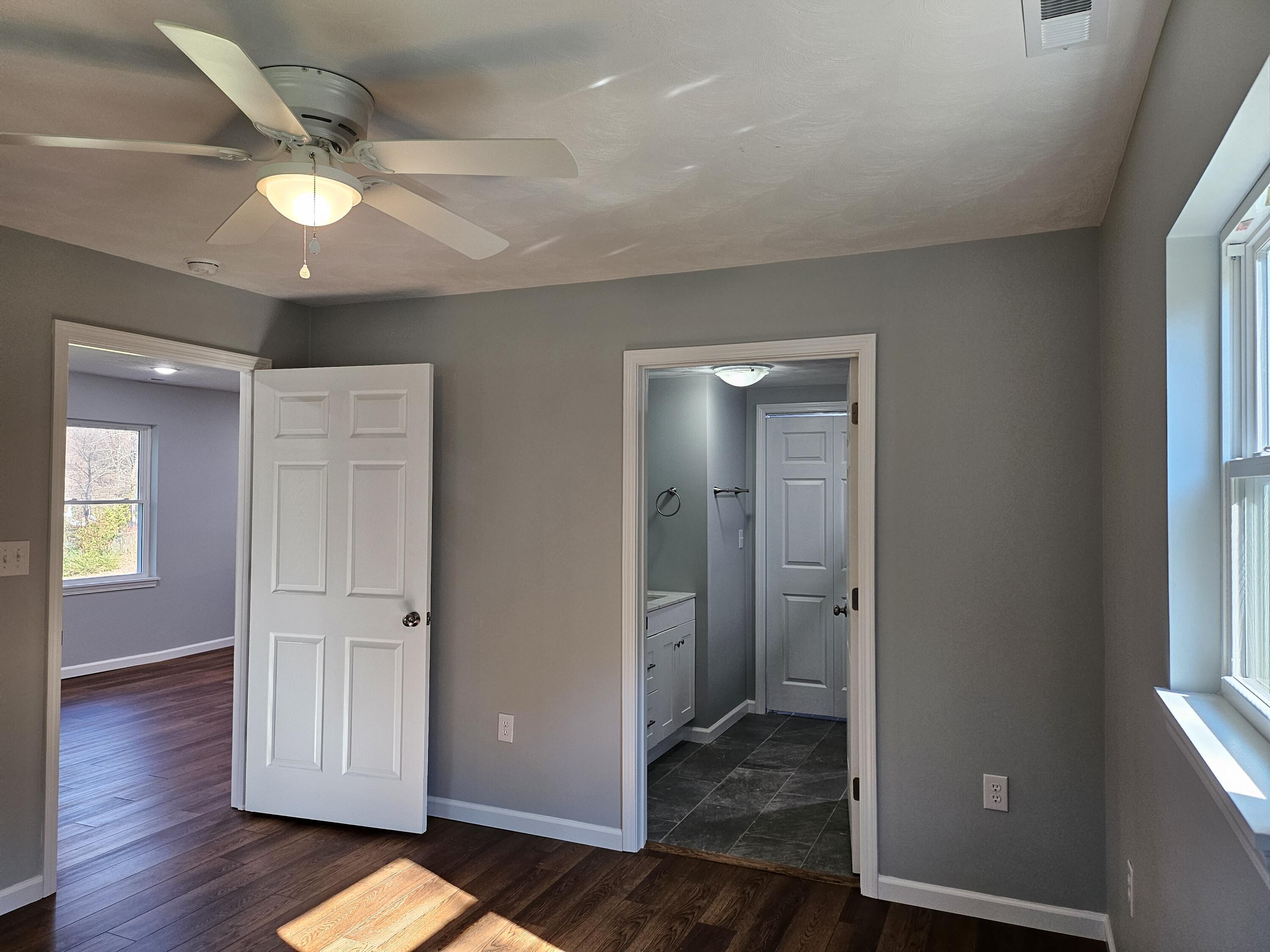 4443 Keefer Road Roanoke, VA 24018 - Photo 17 of 26 wooden floor in an empty room with a window