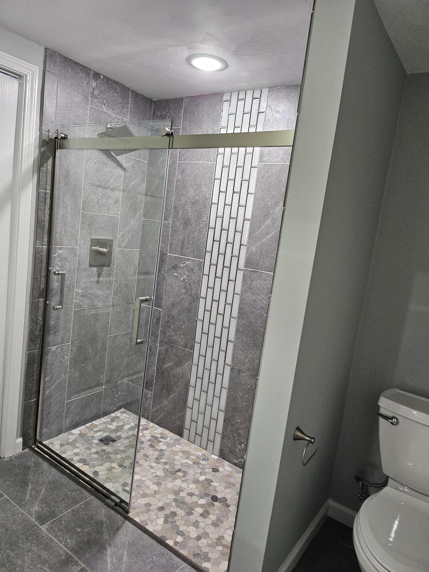 4443 Keefer Road Roanoke, VA 24018 - Photo 18 of 26 a bathroom with a shower and toilet
