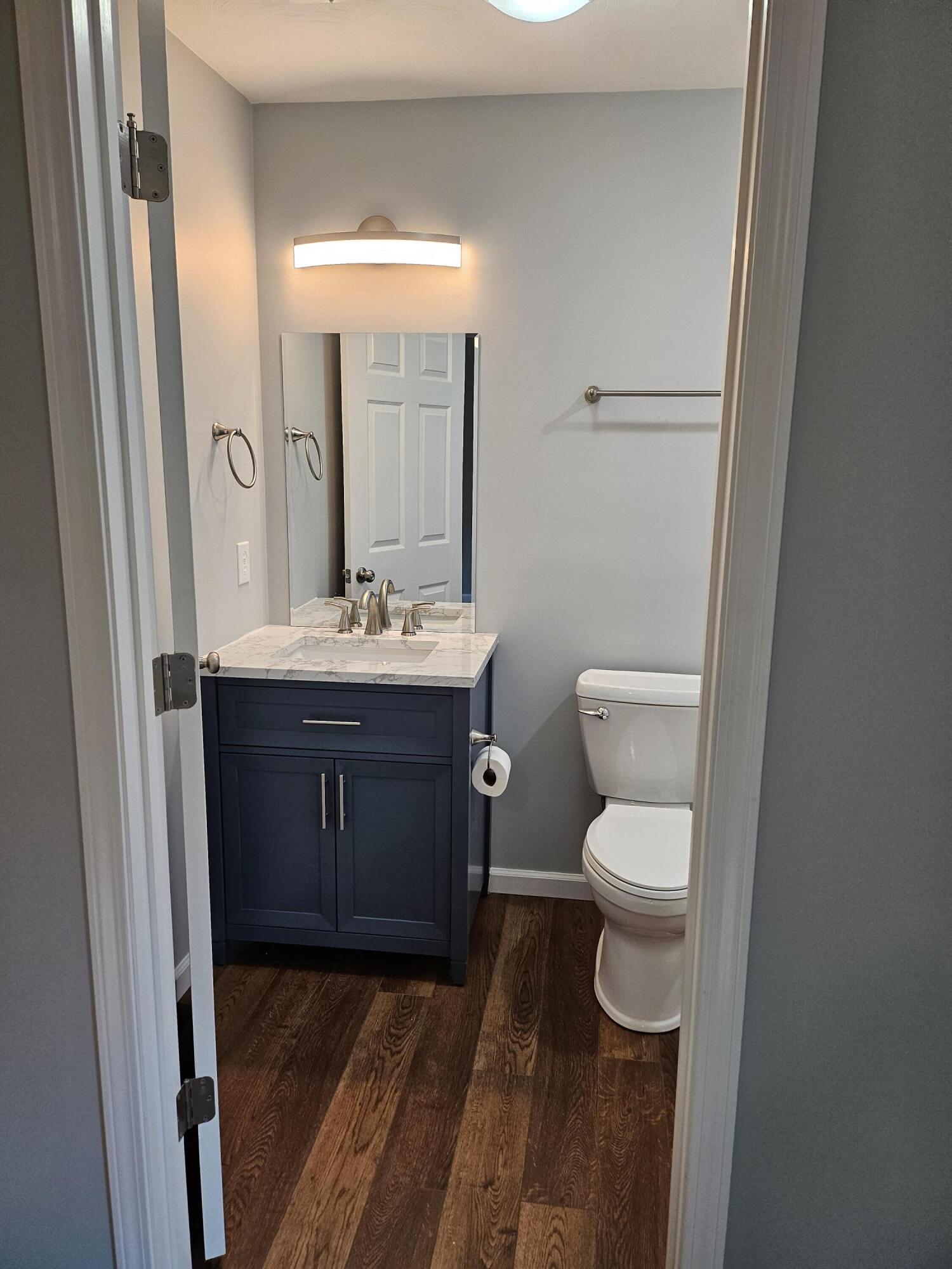 4443 Keefer Road Roanoke, VA 24018 - Photo 24 of 26 a bathroom with a toilet sink and mirror