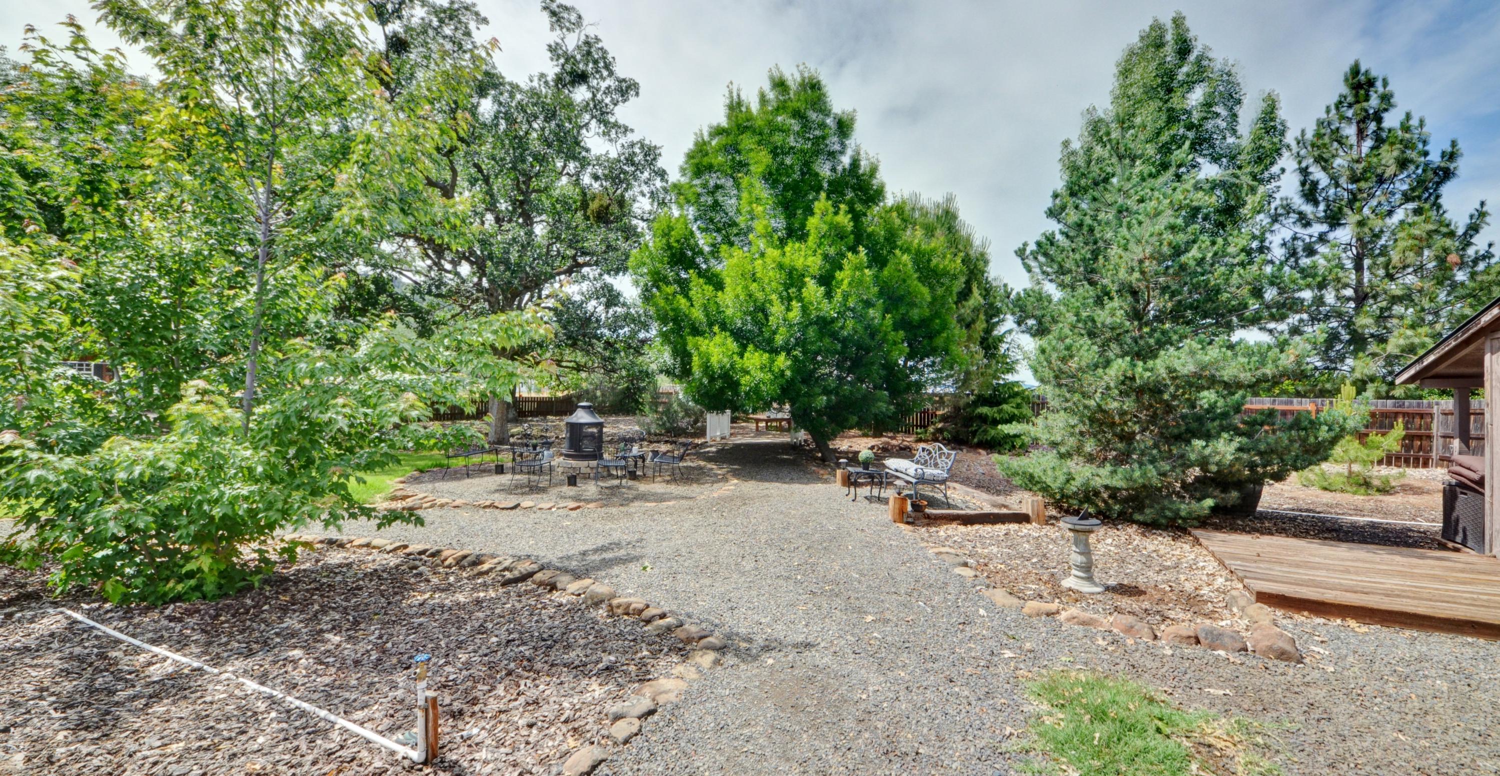 11005 Antioch Road White City, OR 97503 - Photo 35 of 62 Back yard sitting area.