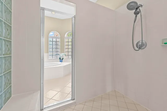 a view of a livingroom with furniture and a flat screen tv