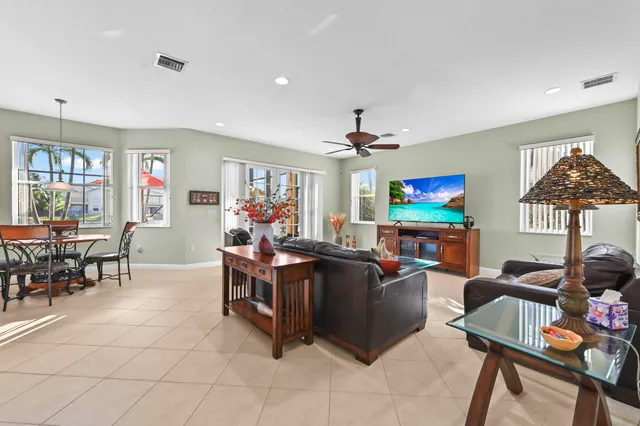 a view of livingroom with furniture and floor to ceiling window