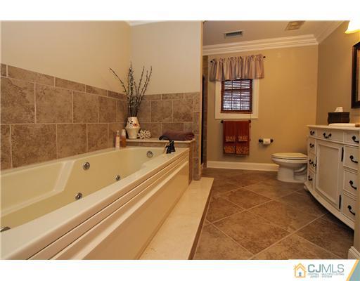32 South Rhoda Street Monroe Township, NJ 08831 - Photo 12 of 20 a spacious bathroom with a bathtub and shower