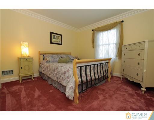 32 South Rhoda Street Monroe Township, NJ 08831 - Photo 13 of 20 a spacious bedroom with a bed and a window