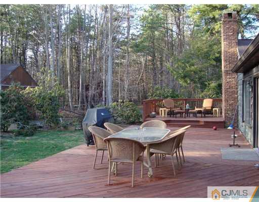 32 South Rhoda Street Monroe Township, NJ 08831 - Photo 20 of 20 a patio with table and chairs