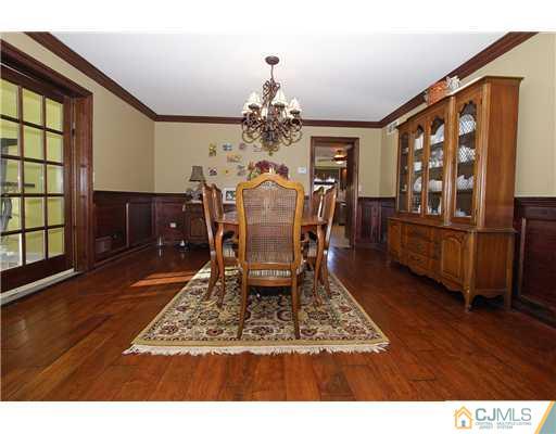 32 South Rhoda Street Monroe Township, NJ 08831 - Photo 5 of 20 a view of a dining room with furniture window and wooden floor