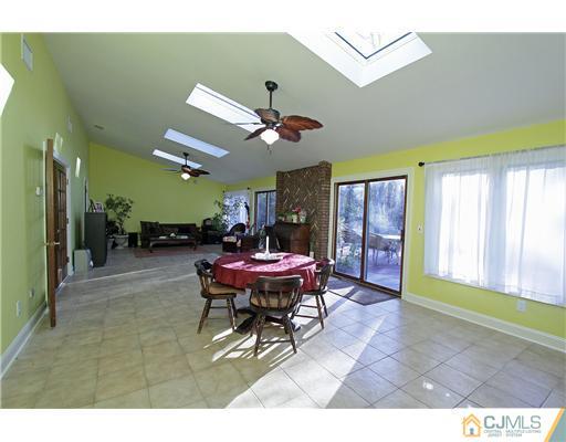 32 South Rhoda Street Monroe Township, NJ 08831 - Photo 7 of 20 a view of a dining room with furniture window and outside view