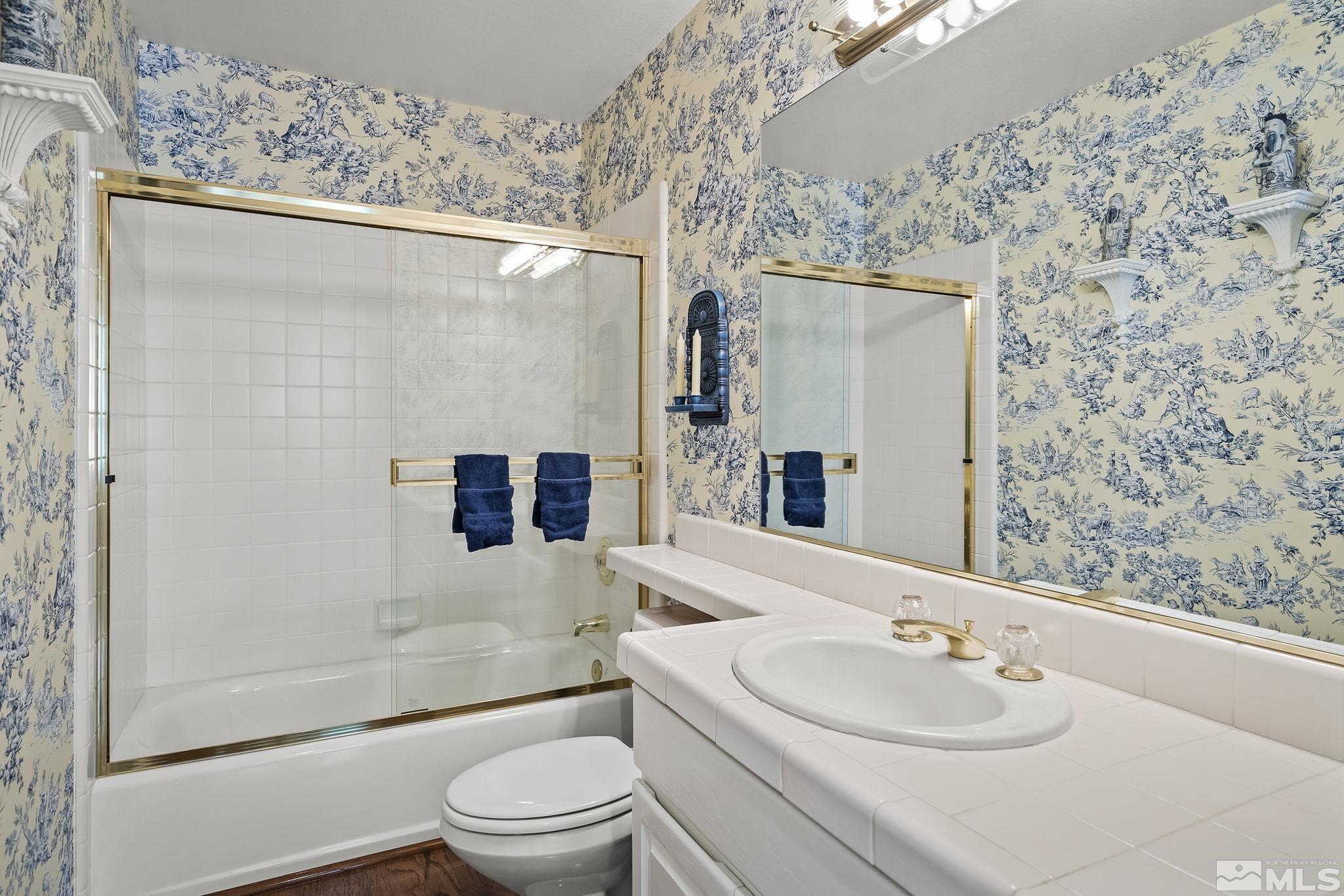 3835 Chinook Creek Road Reno, NV 89519 - Photo 17 of 29 a bathroom with a sink and a mirror