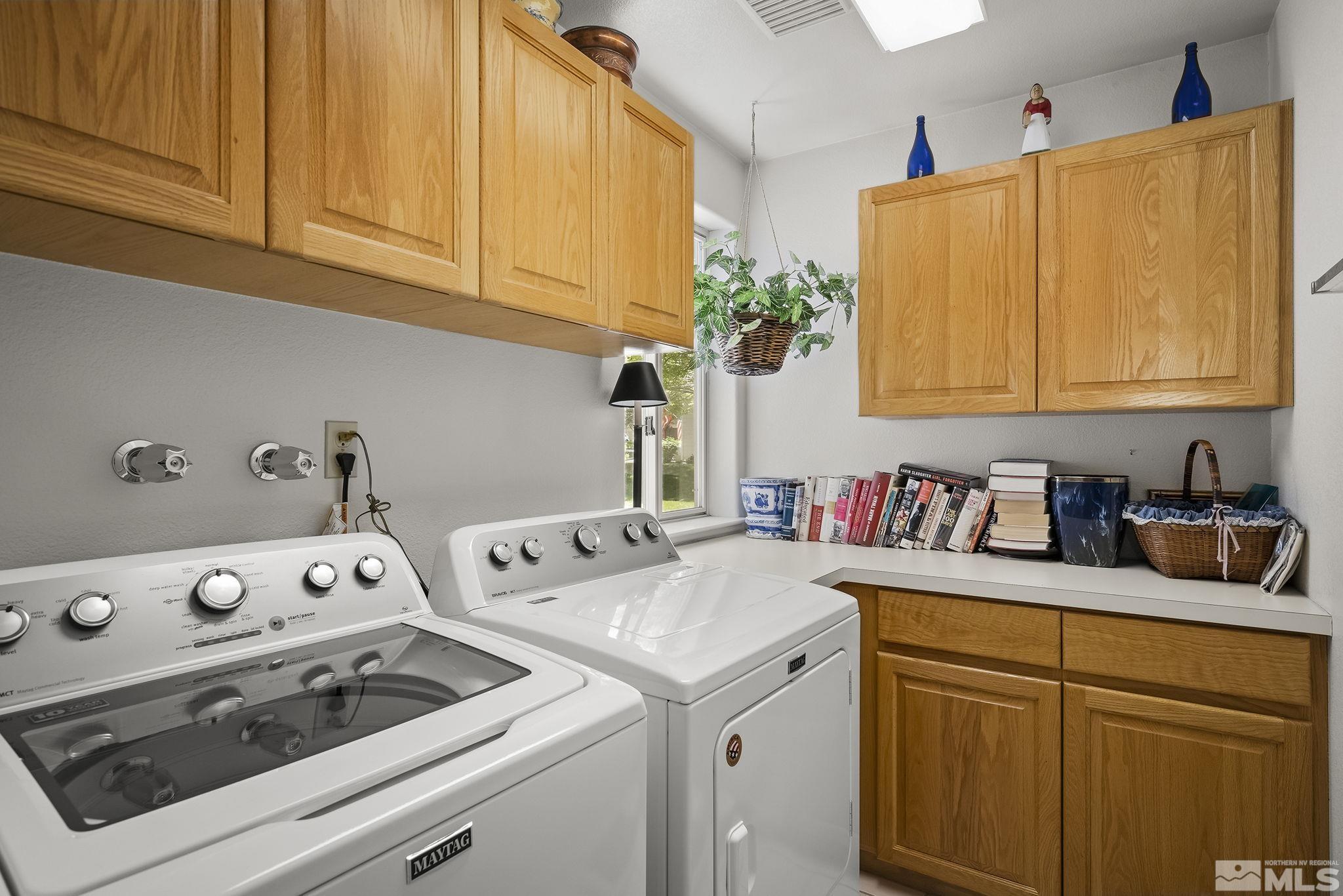 3835 Chinook Creek Road Reno, NV 89519 - Photo 19 of 29 a utility room with sink dryer and washer