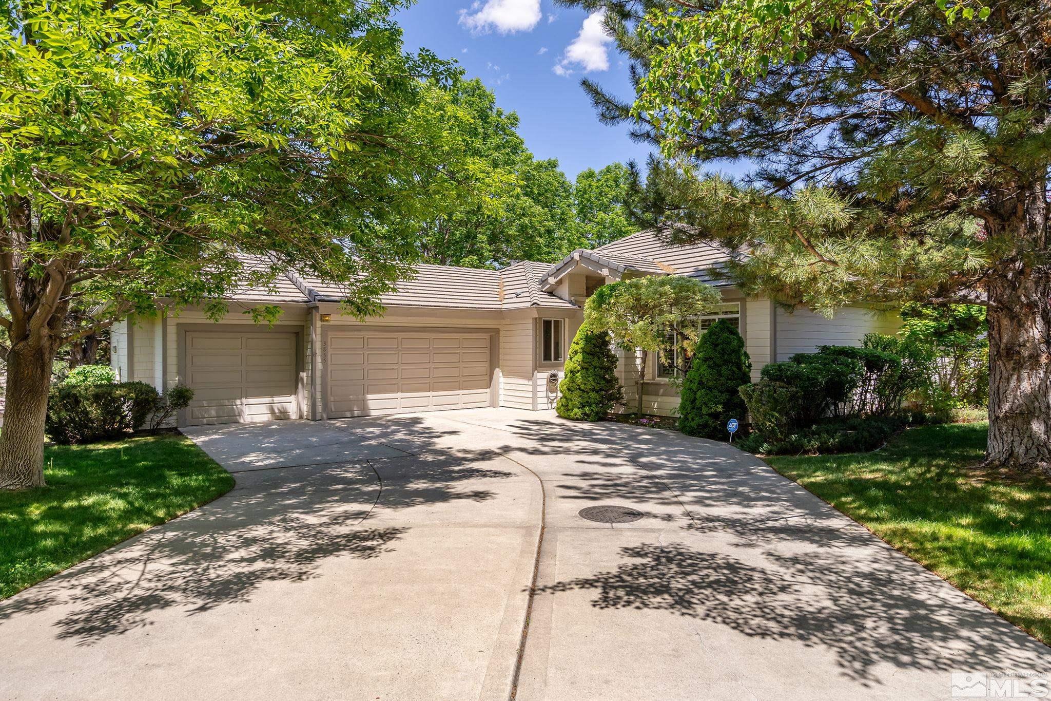 3835 Chinook Creek Road Reno, NV 89519 - Photo 2 of 29 a view of a house with a yard and large tree