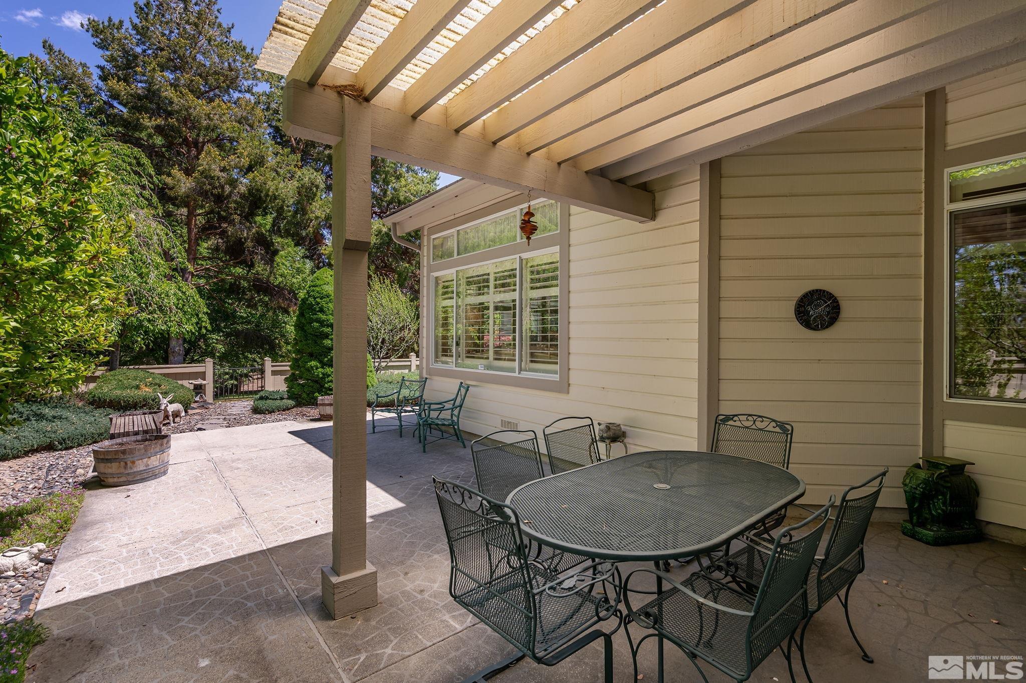 3835 Chinook Creek Road Reno, NV 89519 - Photo 23 of 29 a backyard of a house with outdoor seating