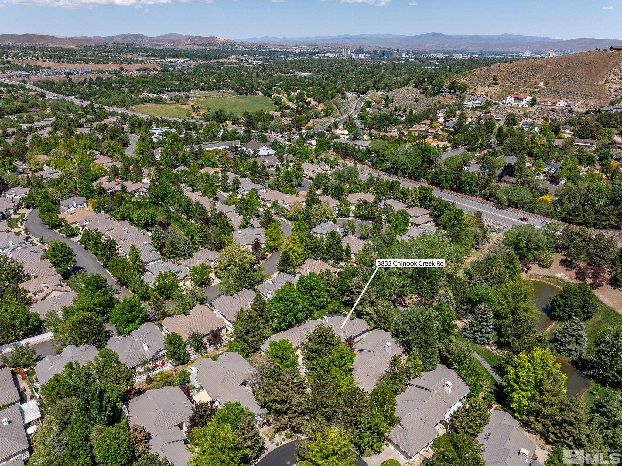 3835 Chinook Creek Road Reno, NV 89519 - Photo 25 of 29 an aerial view of a city with lots of residential buildings