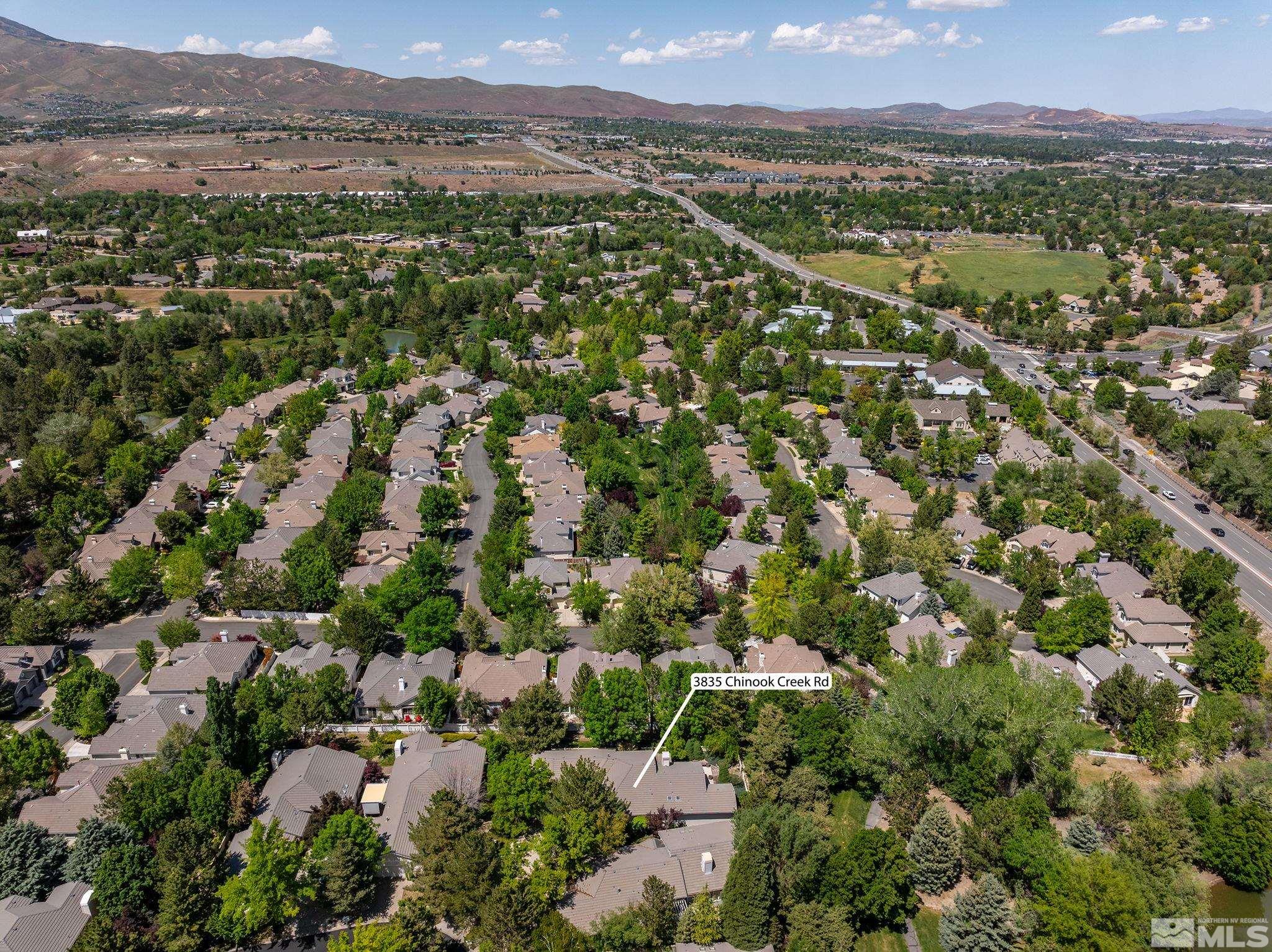 3835 Chinook Creek Road Reno, NV 89519 - Photo 29 of 29 an aerial view of a city with lots of residential buildings