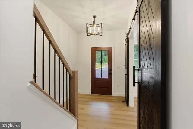 a view of a hallway with windows