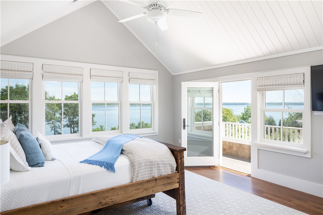 1088 East Shore Road Jamestown, RI 02835 - Photo 29 of 50 A second ensuite Master bedroom on the 2nd floor with private deck over looking gardens and waterviews