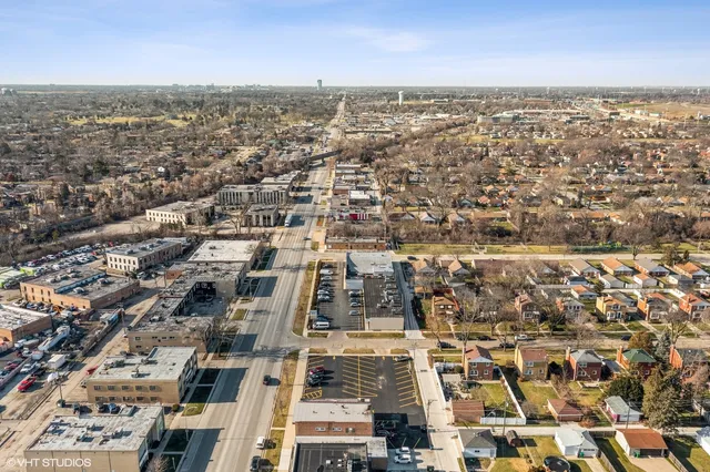 an aerial view of residential building and parking space
