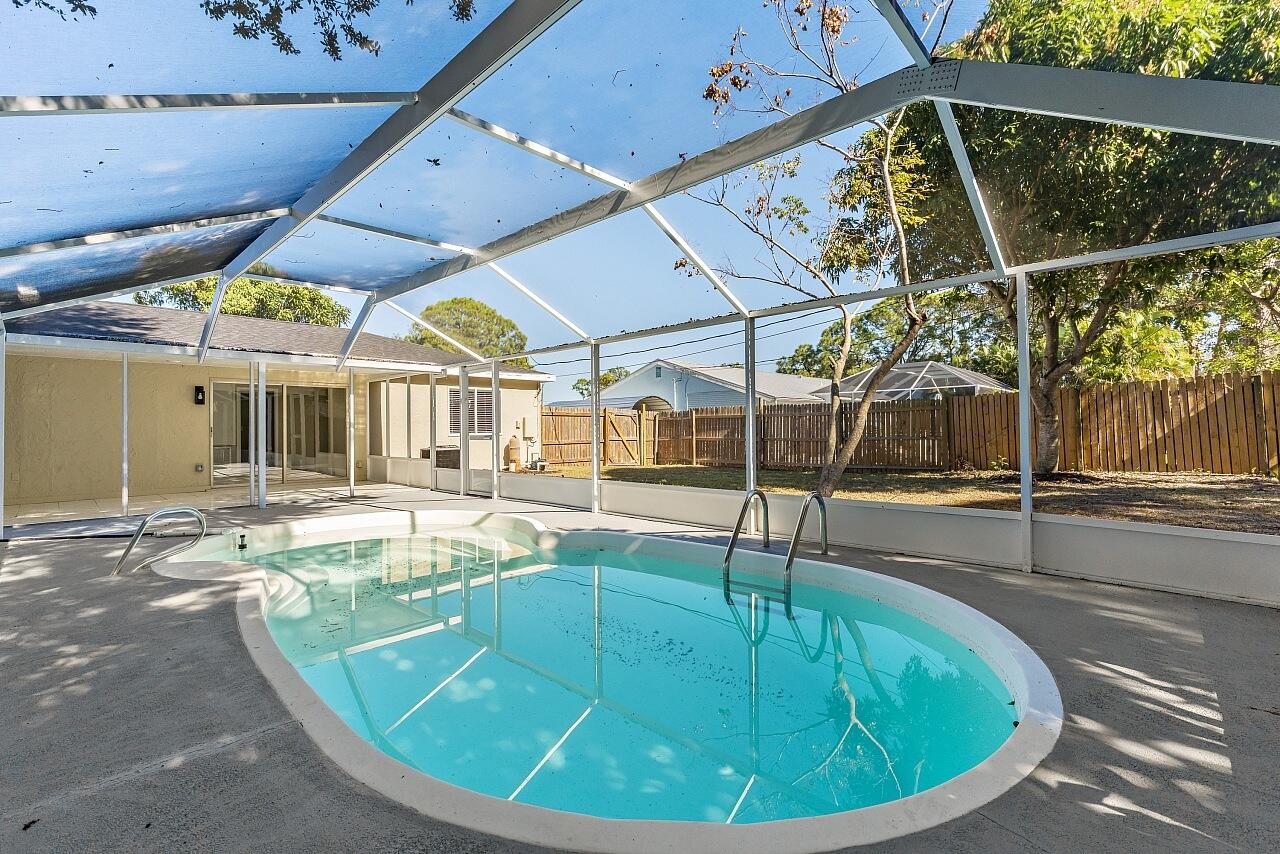 111 Alameda Avenue Sebastian, FL 32958 - Photo 25 of 33 a view of a swimming pool with a patio