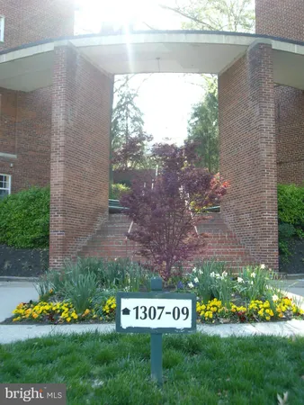 a view of a building with a yard