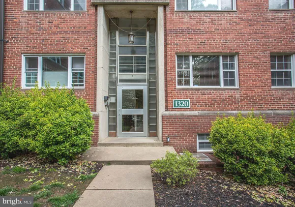 a front view of a multi story residential apartment building