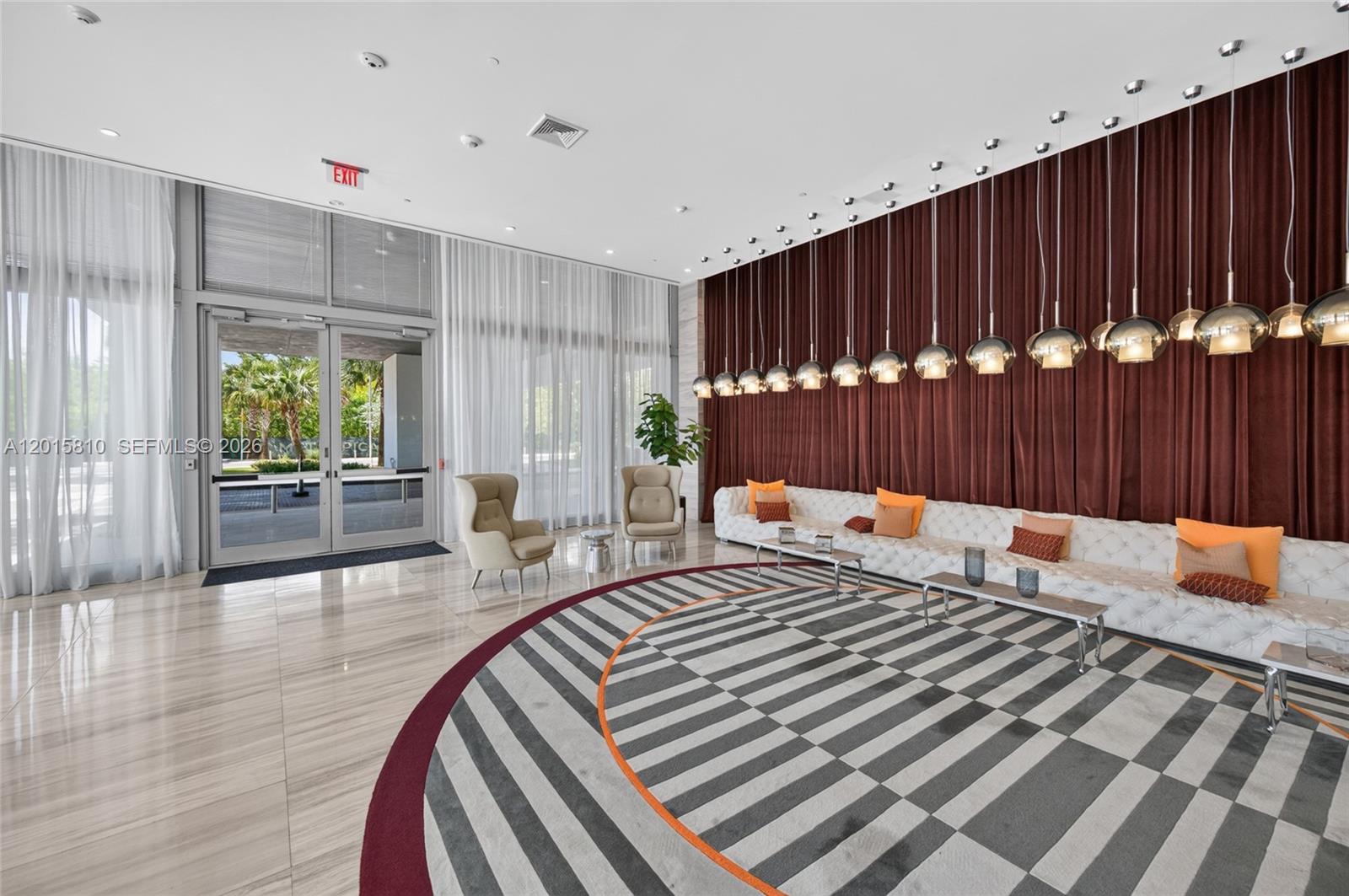 2000 Metropica Way, Unit 1902 Sunrise, FL 33323 - Photo 38 of 40 a bedroom with furniture and window