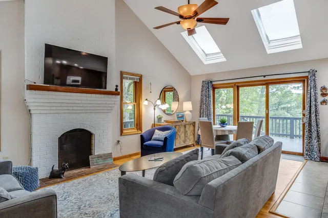 a kitchen with stainless steel appliances granite countertop sink stove top oven and cabinets
